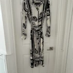 Featured thumbnail for Robe mi-longue à motif de fleurs