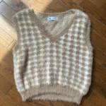 Featured thumbnail for Sleeveless waistcoat