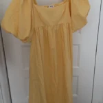 Featured thumbnail for Robe midi jaune beurre avec manches bouffantes