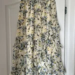 Featured thumbnail for All in Favor ruffled skirt size S floral motifs