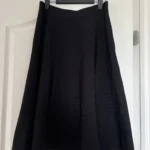 Featured thumbnail for MaxAzria BCBG knitted skirt in size M black