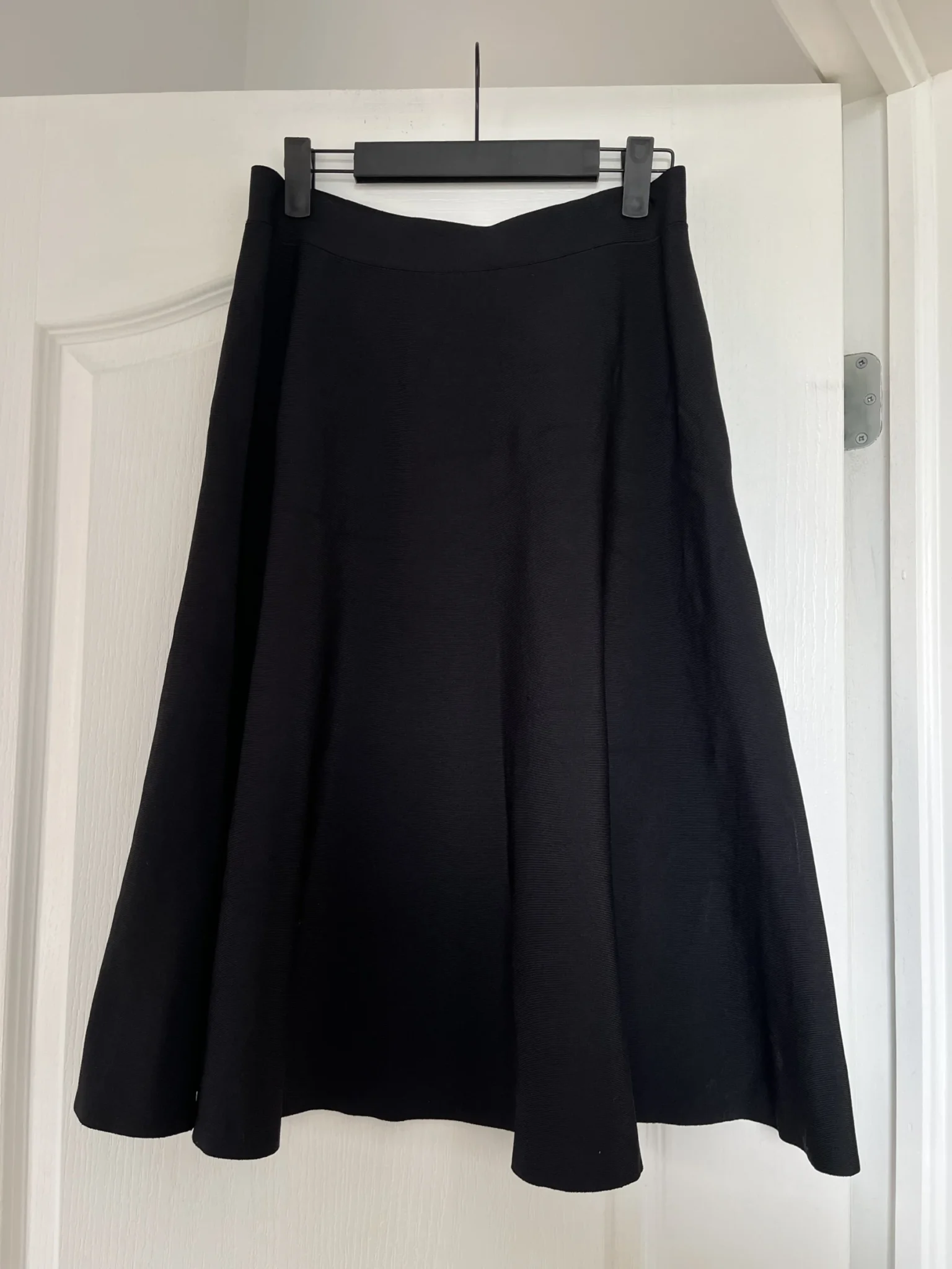 Featured image for MaxAzria BCBG knitted skirt in size M black