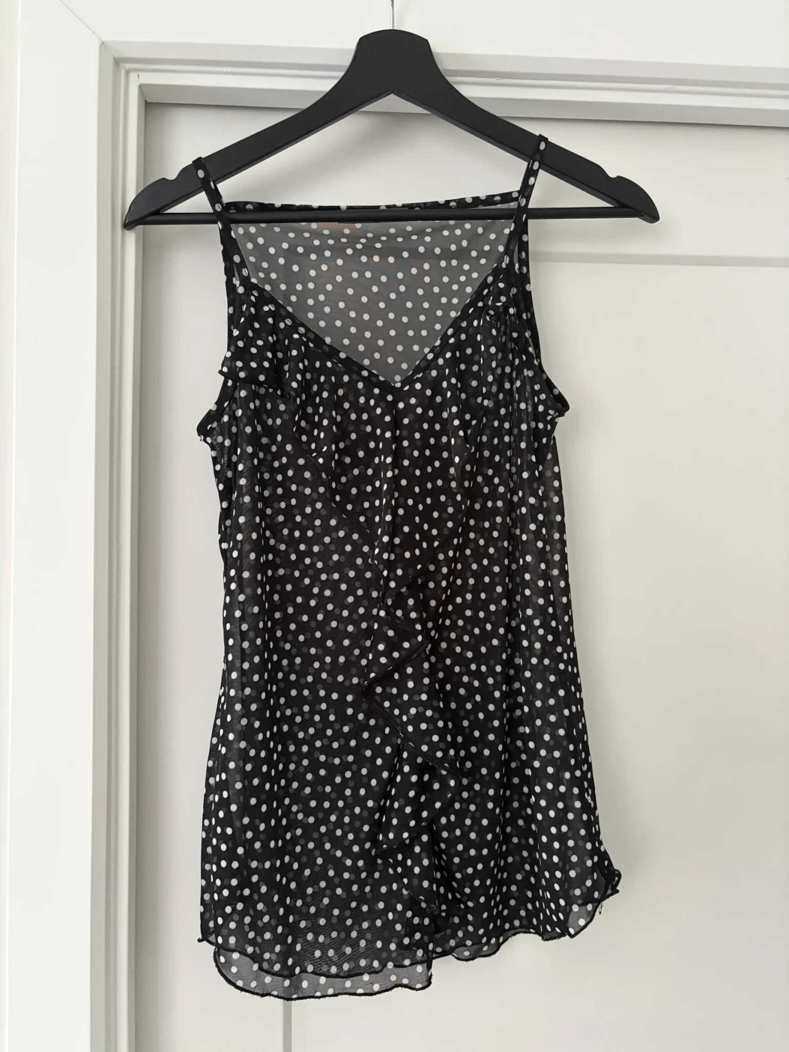Featured image for Black camisole with sheer polka dots