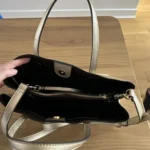Thumbnail for Gold bag and purse