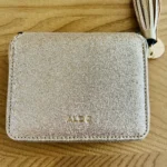 Thumbnail for Gold bag and purse
