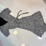 Featured thumbnail for Robe style portefeuille noire avec détails de fleurs