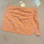 Featured thumbnail for Jupe orange avec motifs