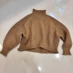 Featured thumbnail for Pull doux brun H&M