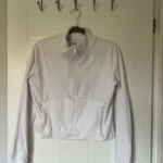 Featured thumbnail for Haut sport blanc zip 3/4