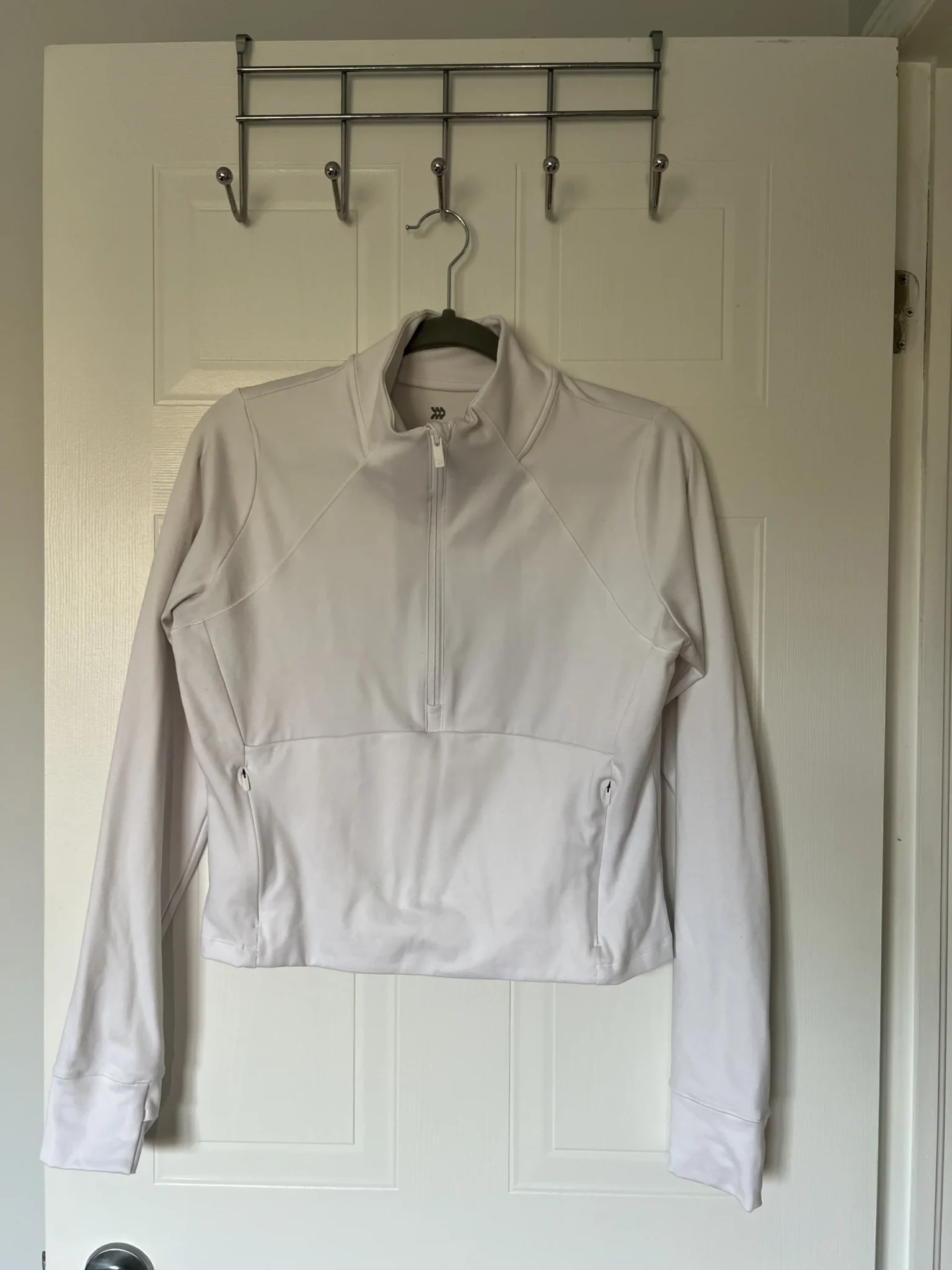 Featured image for Haut sport blanc zip 3/4