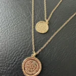 Featured thumbnail for Collier double médaillon Amber Sceats