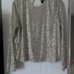 Featured thumbnail for Chandail manches longues à paillettes