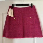 Featured thumbnail for Jupe Bash rose en tweed en taille 40 neuf