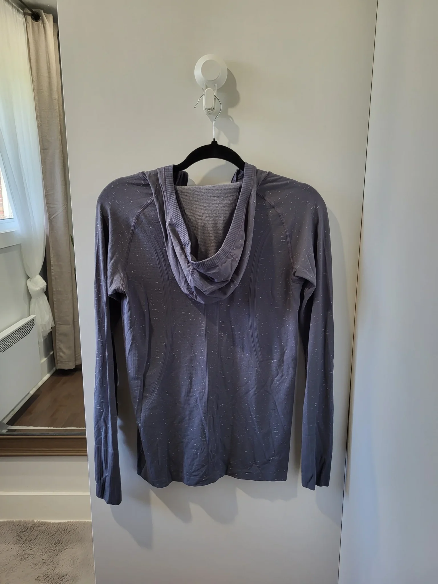 Image for Lululemon- long-sleeved sports top.