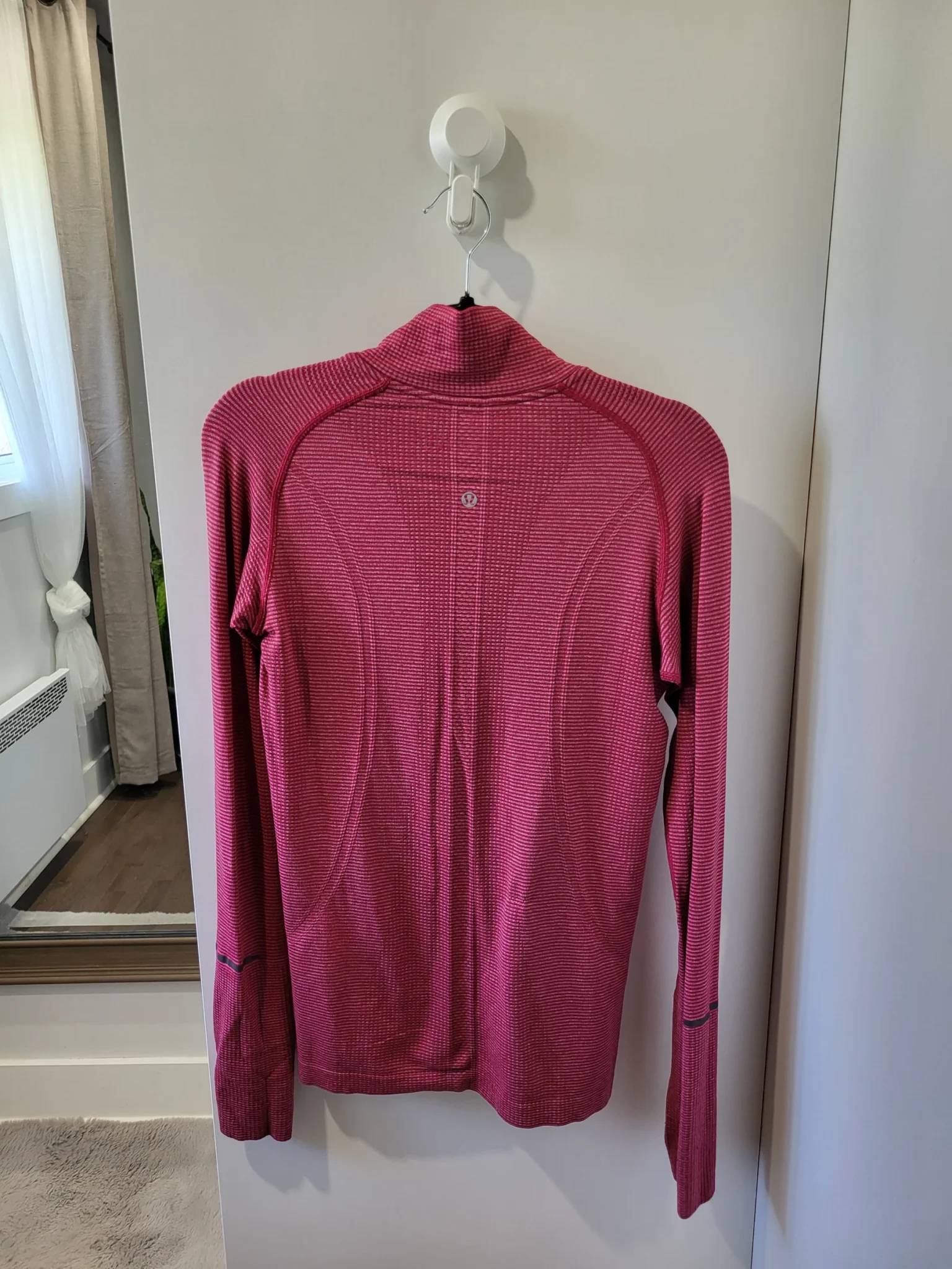 Image for Lululemon- long-sleeved sports top.