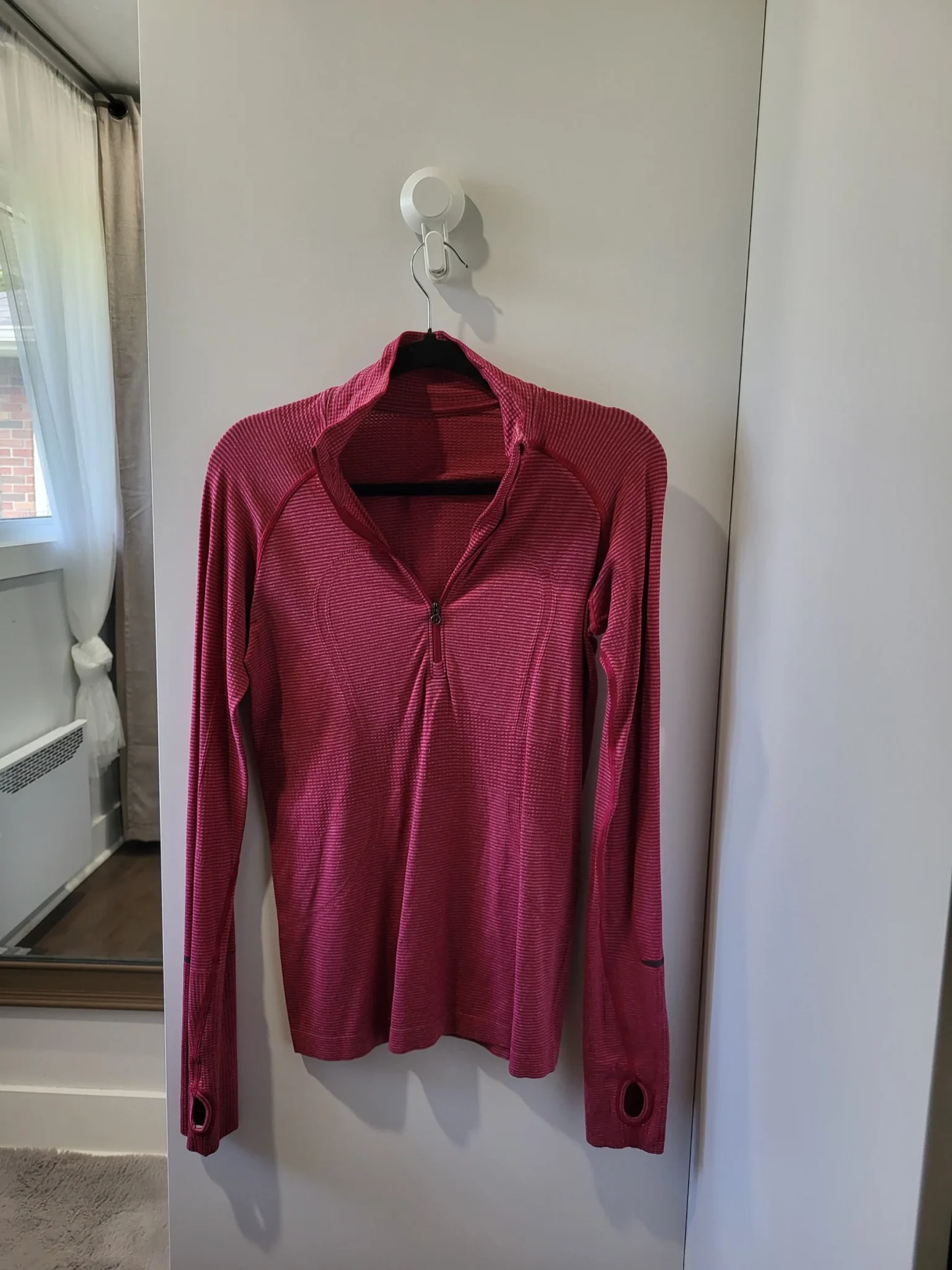 Image for Lululemon- long-sleeved sports top.