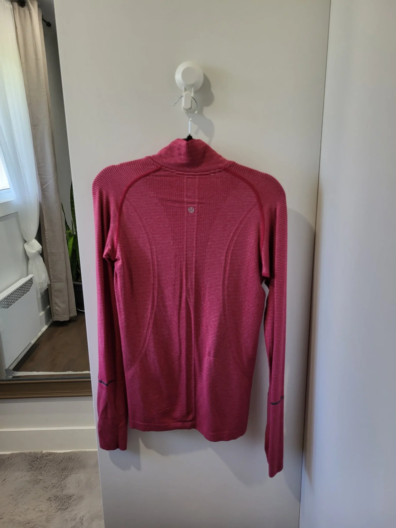 Image for Lululemon- long-sleeved sports top.