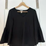 Featured thumbnail for Women's black blouse with puffed sleeves