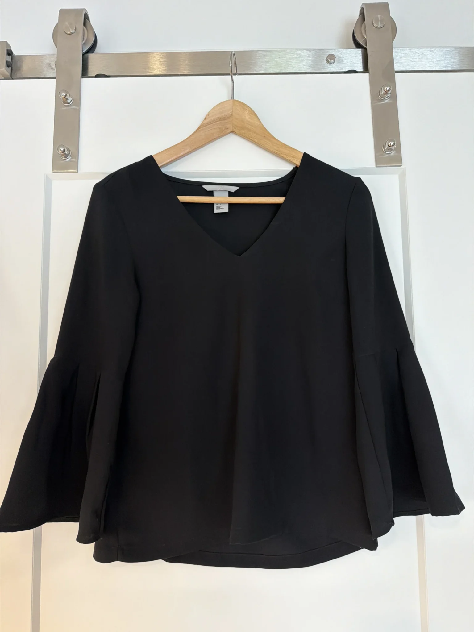 Featured image for Women's black blouse with puffed sleeves