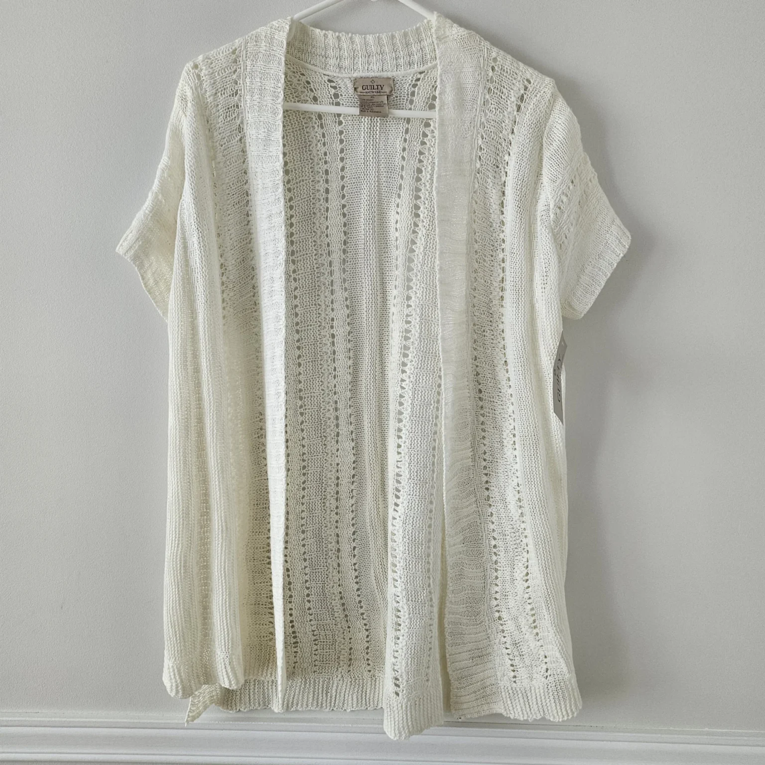 Featured image for Long, light overcoat