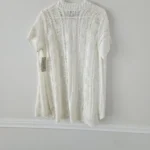 Thumbnail for Long, light overcoat