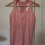 Featured thumbnail for Swiftly Tech Racerback Tank Top  Hip Length