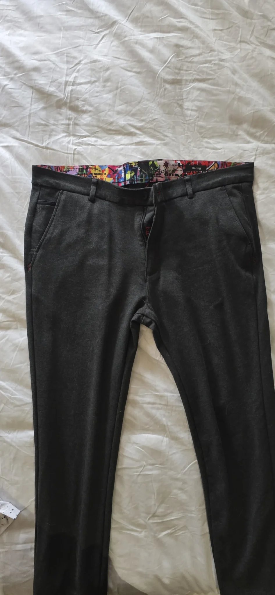 Featured image for Black trousers in grey
