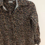 Featured thumbnail for Black floral blouse