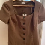 Featured thumbnail for Aritzia | haut a boutons