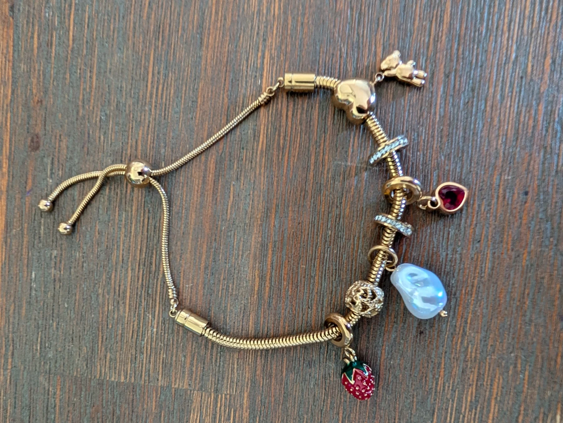 Bracelet à breloques *Autre seconde main