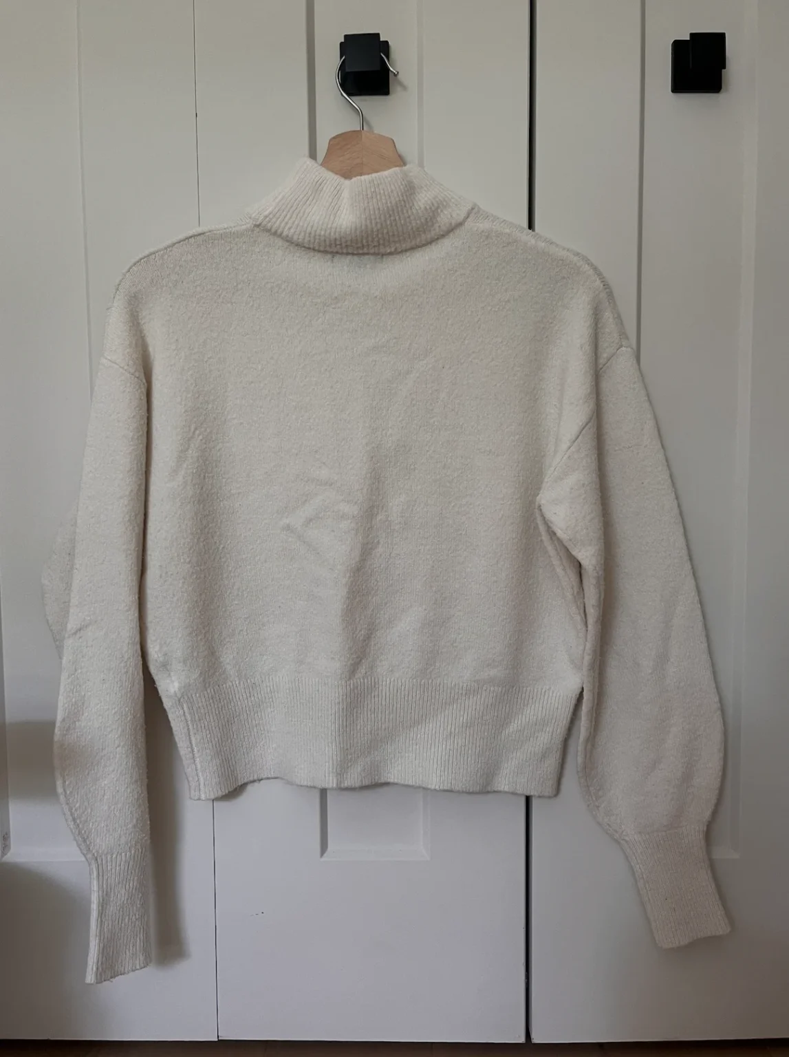 Image for Wool jumper with a high collar