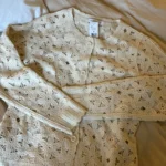 Thumbnail for Floral openwork cardigan