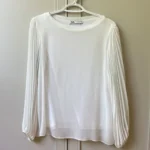 Featured thumbnail for White, loose-fitting top with sheer balloon sleeves