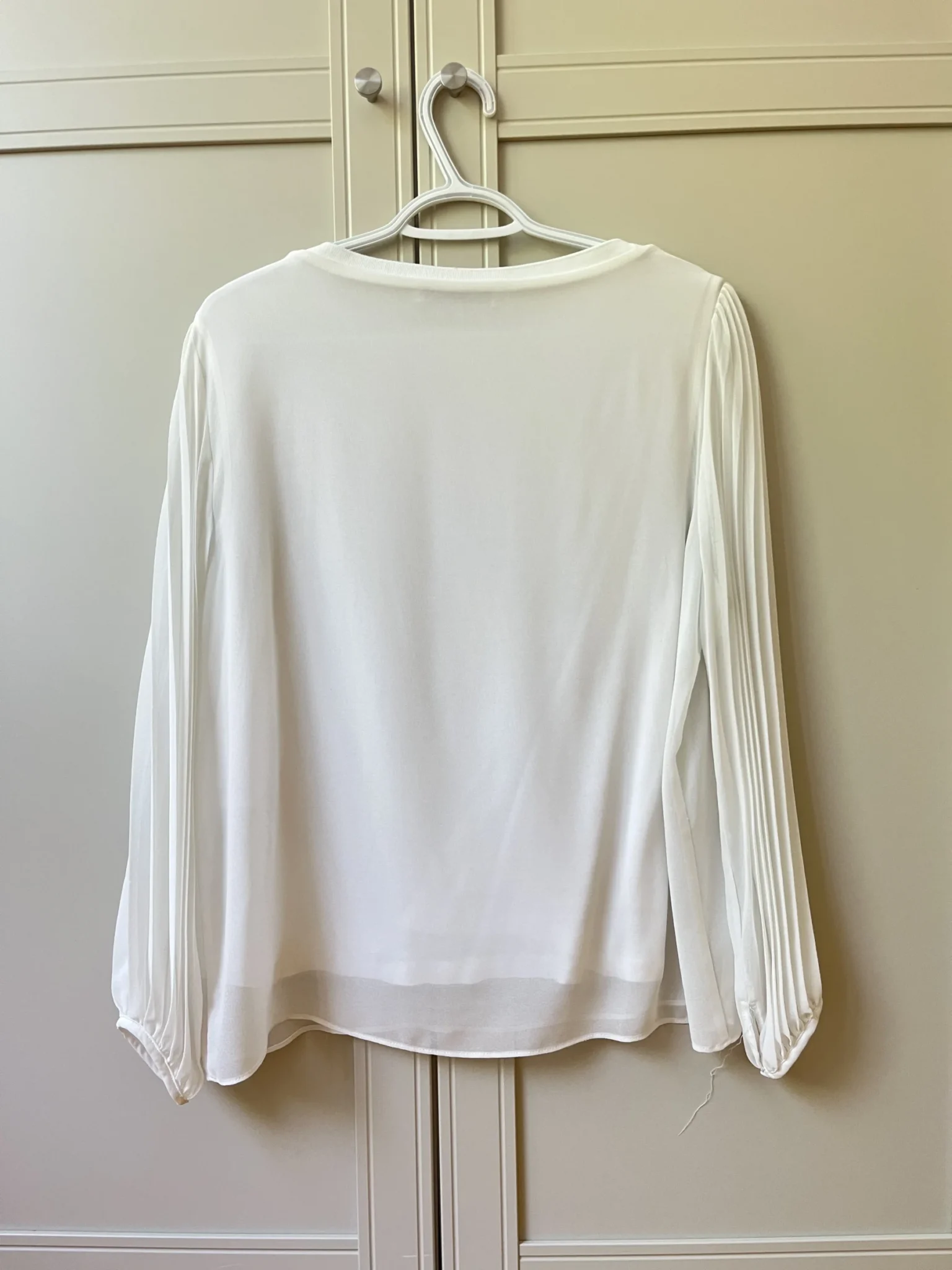 Image for White, loose-fitting top with sheer balloon sleeves