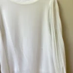 Thumbnail for White, loose-fitting top with sheer balloon sleeves