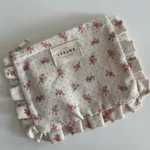 Featured thumbnail for Pochette Sézane beige fleuris rose