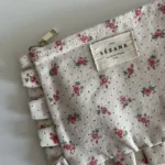 Thumbnail for Pochette Sézane beige fleuris rose