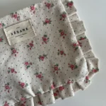 Thumbnail for Pochette Sézane beige fleuris rose