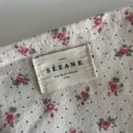 Thumbnail for Pochette Sézane beige fleuris rose