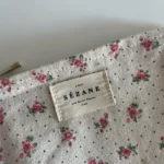 Thumbnail for Pochette Sézane beige fleuris rose