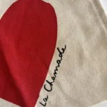 Thumbnail for Pochette Sézane La chamade beige et rouge