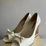 Featured thumbnail for Sandales compensées Prada taille 40