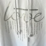 Thumbnail for A lovely white hoodie in a large size with an original slogan on the front.