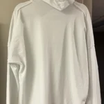 Thumbnail for A lovely white hoodie in a large size with an original slogan on the front.