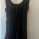 Featured thumbnail for Black ruffled dress