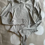 Featured thumbnail for Body sculptant manche longue
