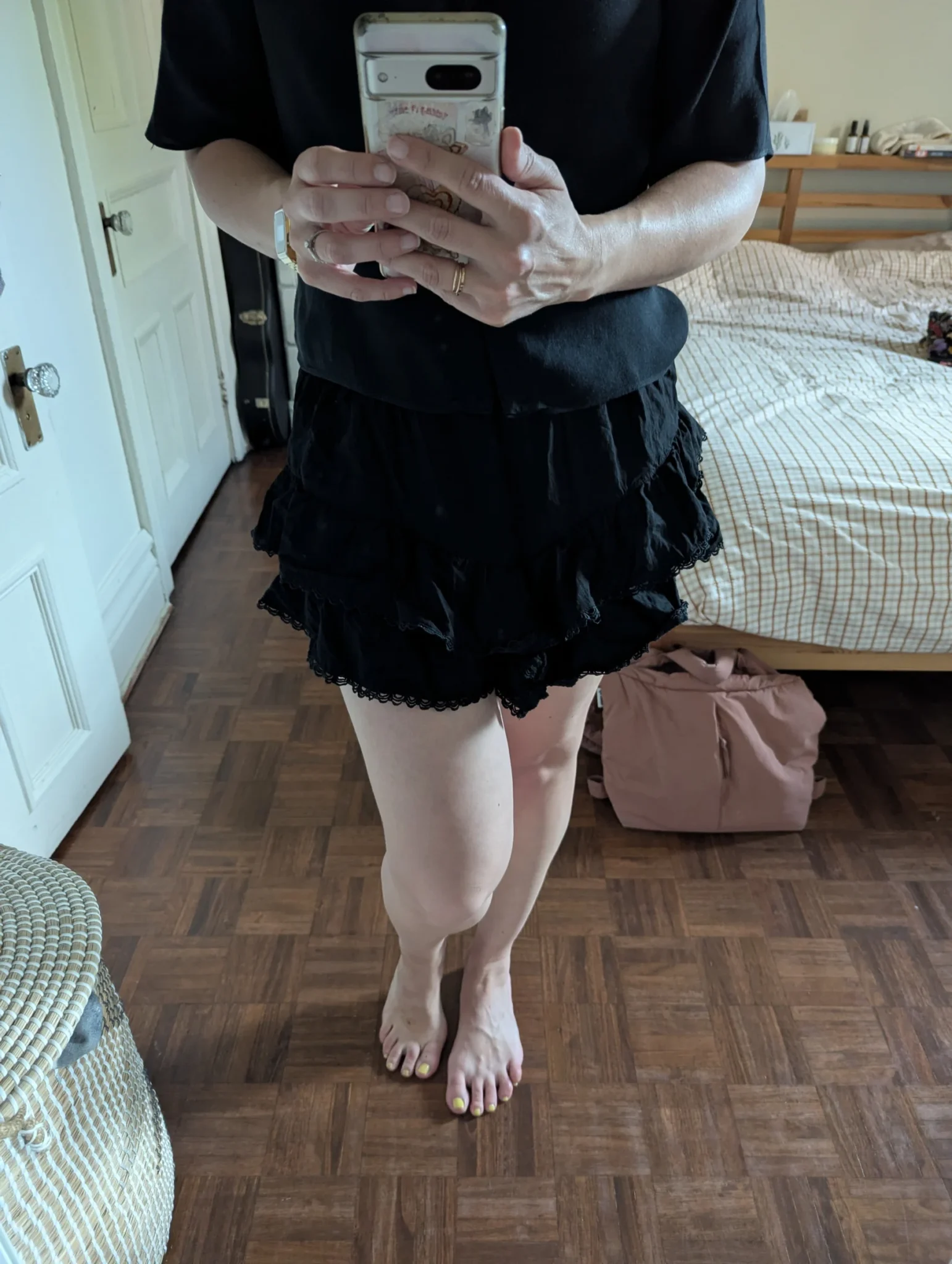 Featured image for Black frilly skirt with shorts underneath