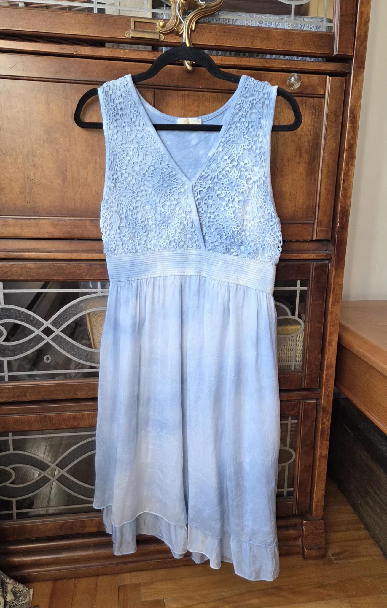 Image for A beautiful light blue sleeveless dress made from a silk blend