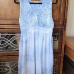 Thumbnail for A beautiful light blue sleeveless dress made from a silk blend