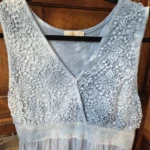 Thumbnail for A beautiful light blue sleeveless dress made from a silk blend